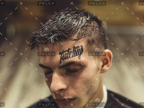 demo-attachment-328-portrait-of-man-with-tattoo-PJPNNRD-2